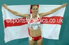 Laura Weightman (England) with the England flag after finishing 2nd in the 1500 metres, 2014 Commonwealth Games, Glasgow. Photo: David T. Hewitson/Sports for All Pics